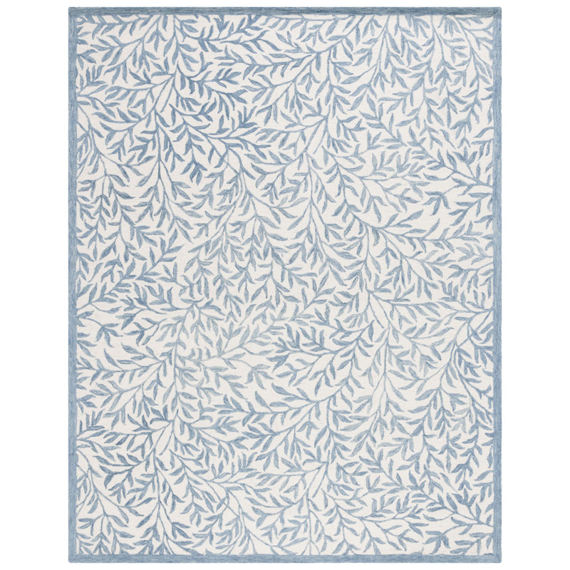 Iqarar Hand Tufted Wool/Cotton Floral Rug in Blue/Ivory, Rectangle 8' x 10'