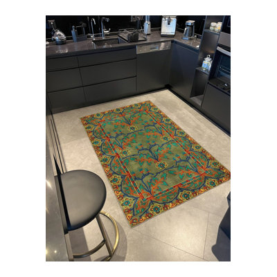 Tapis décoratif vert à motif floral multicolore