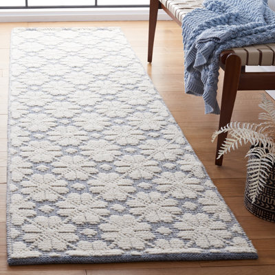 Tapis bleu / ivoire en laine tissé à la main Sharene