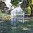 Gulianna 4.5' x 2' x 6.5' Outdoor Portable Walk-In Greenhouse with 4 Shelves with a Clear Cover