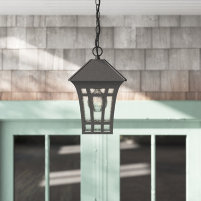 B3C3A280BAAA41BAA107FB4B80CA9107 One Light Outdoor Pendant With Clear Seeded Glass Panels