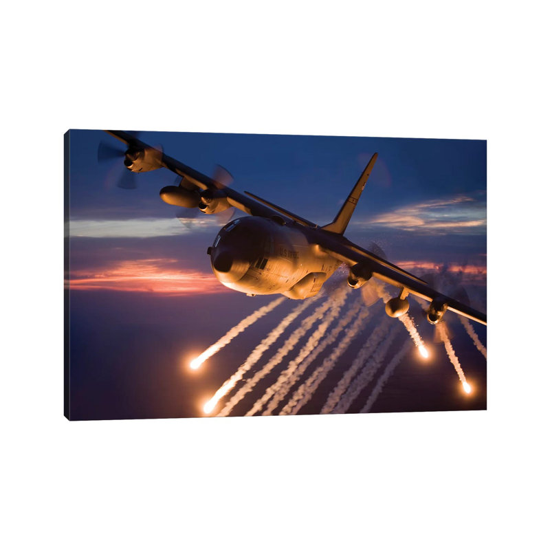 C-130 Hercules Releases Flares During A Mission Over Kansas by HIGH-G Productions - Wrapped Canvas Print
