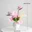 Ornements de fleurs simulées