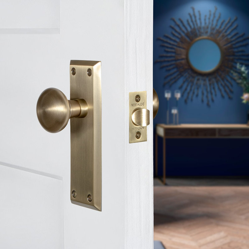 New York Plate with New York Door Knob, 2-3/8", Antique Brass
