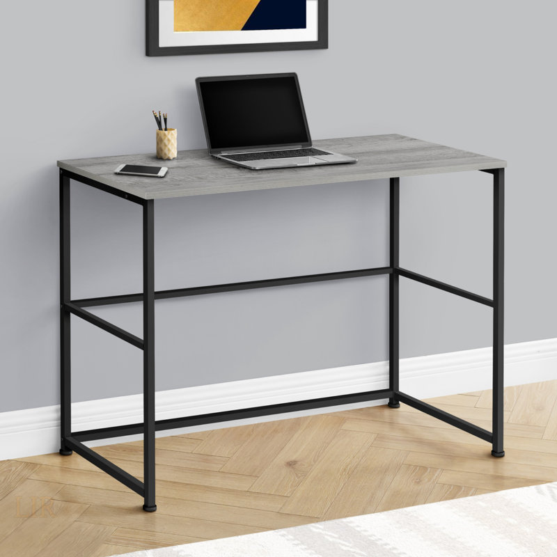 Bureau d'ordinateur moderne en stratifié gris avec tiroirs de rangement, polyvalent pour le bureau à domicile et les espaces compacts, à gauche ou à droite.