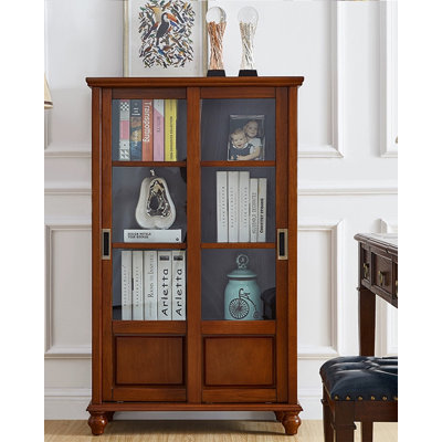 Petite bibliothèque traditionnelle avec portes supérieures en verre et inférieures solides