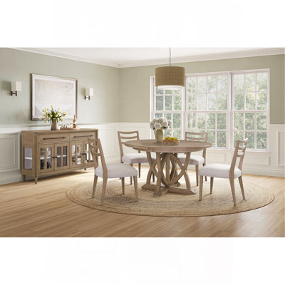 Round Expandable Table With 4 Ladderback Chairs And A Glass Front Sever