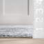 Tapis uni lavable à la machine Argelia-555758638