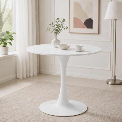 Table de salle à manger ronde blanche avec plateau en panneau de fibres à densité moyenne