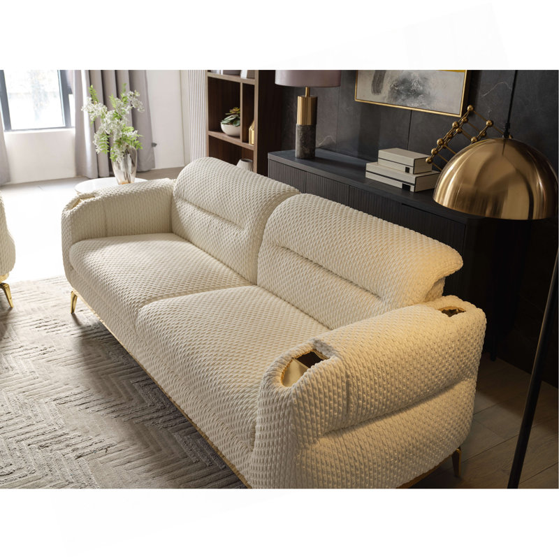 Canapé de style moderne fait de bois et d'accents dorés, Crème
