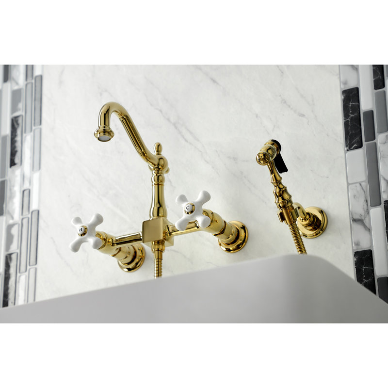 Kingston Brass Heritage Double-Handle 3-Hole Wall-Mount Bridge Kitchen Faucet with Brass Sprayer, Light Gold