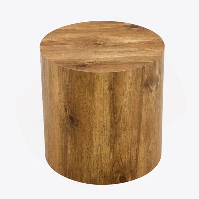 The cylindrical table with its patterned design can be easily integrated
