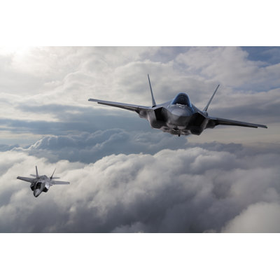 Avion de chasse F-35 survolant les nuages par Guvendemir