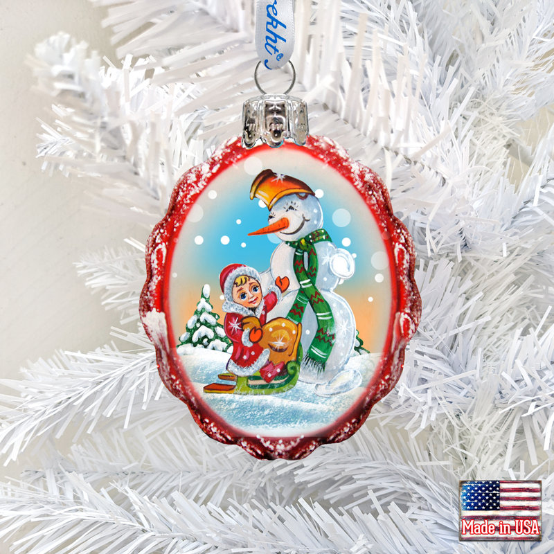 Ornement de verre bonhomme de neige playing