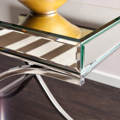 Élégante console à miroir avec finition chromée, parfaite pour ajouter du glamour et de l'élégance aux intérieurs modernes