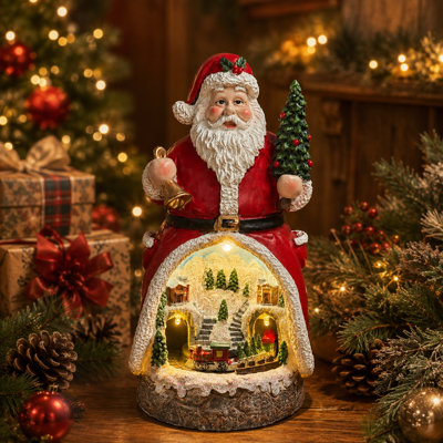 Lighted Musical Santa Figurine with Christmas Village and Train