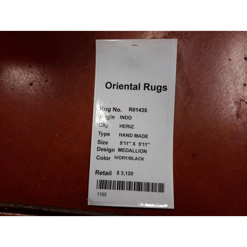 Kellsey Oriental Area Rug in Ivory