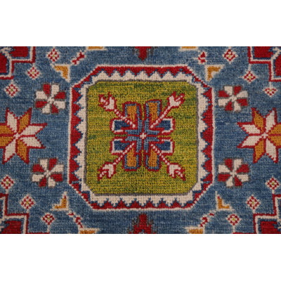 Tapis rouge à motif oriental Kazak