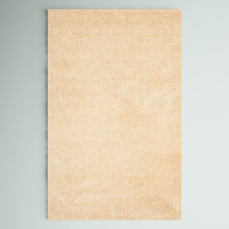 Assar Hand-Tufted Creme Area Rug