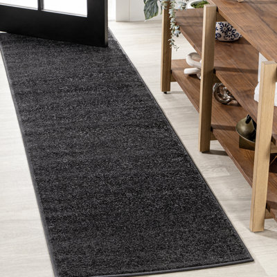 Asaldis Solid Low-Pile Black Rug