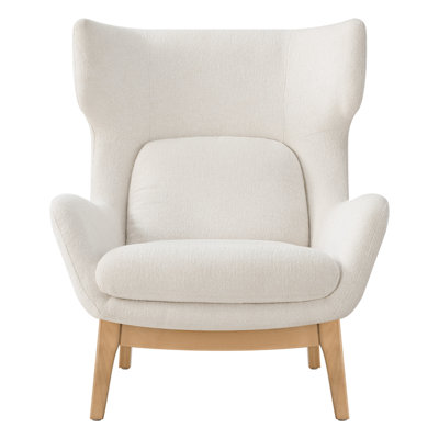 Fauteuil d'appoint moderne à oreilles rembourré, avec coussin lombaire et structure apparente en bois massif.