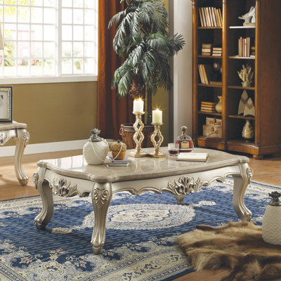 Table basse, plateau en marbre et champagne
