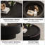 Table basse 31,5 ronde avec rangement cannelé et plateau en verre trempé, similicuir noir élégant