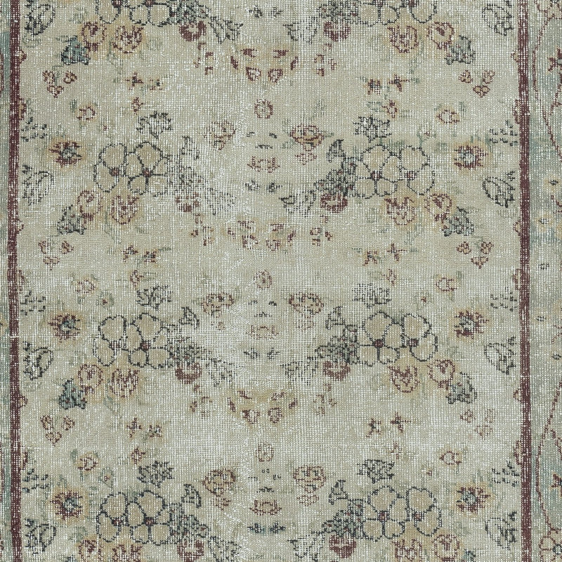 Tapis turc beige vintage à motif floral