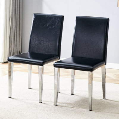 Chaises de salle à manger noires en polyuréthane avec pieds en métal argenté de 2, minimalistes et confortables, rembourrage en éponge à haute élasticité, support antidérapant stable à deux pieds, apparence tendance pour la décoration intérieure,