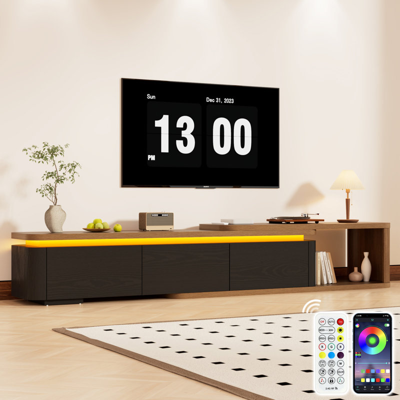 Meuble télé 69 po à 105 po, console multimédia moderne à bord incurvé avec lumières DEL RVB, application et télécommande, 3 grands tiroirs de rangement, centre de divertissement robuste pour le salon
