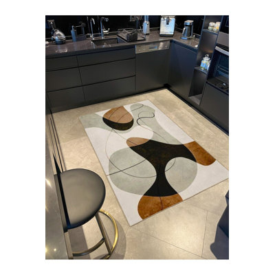 Tapis rond lavable rayé à motifs tissés