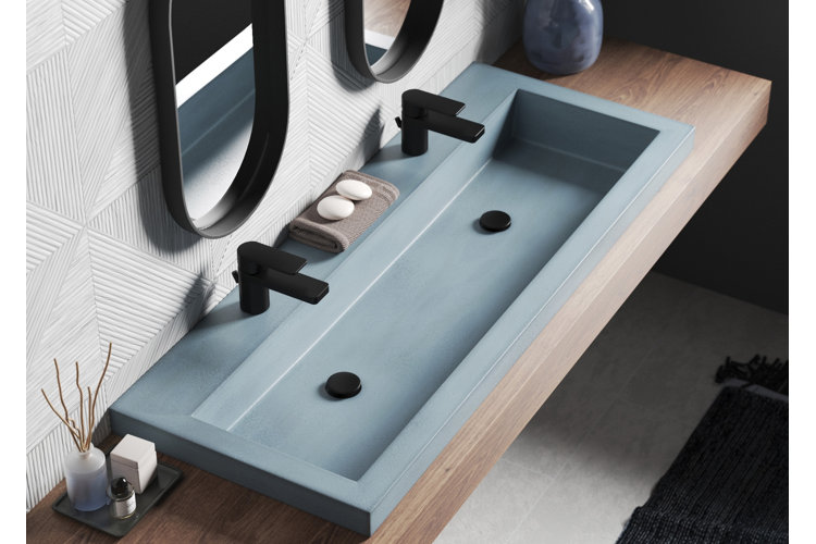 aerial view of a blue-gray trough sink with two faucets