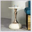 Table d'appoint ronde compacte pour les petits espaces, idéale comme table basse de salon ou de bout avec un design élégant et durable