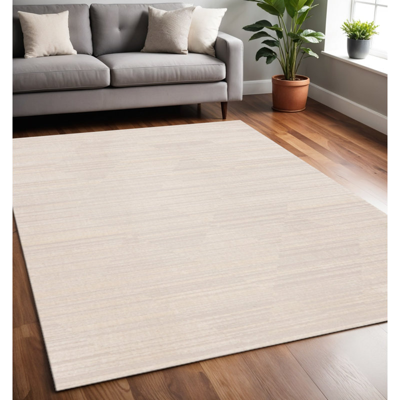 Tapis beige 5 pi x 8 pi