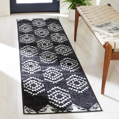 Tapis tissé géométrique noir / ivoire Gonsales