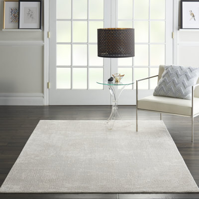 Tapis ivoire tissé à la machine