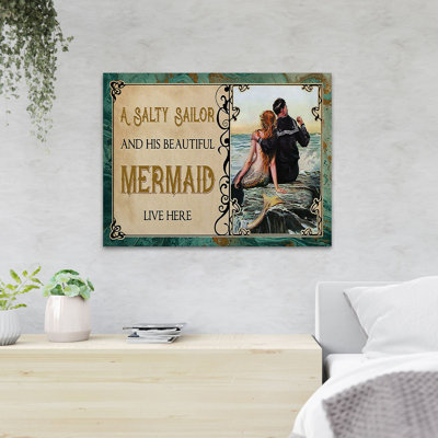 A Salty Sailor And His Beautiful Mermaid Live Here - Wrapped Canvas Textual Art