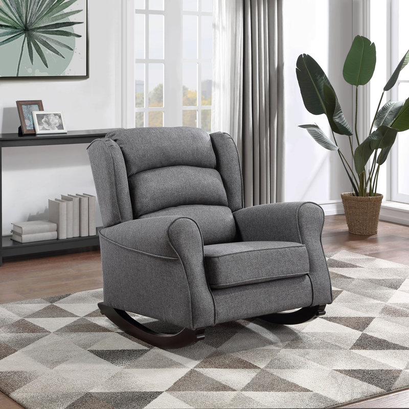 Chaise berçante grise avec accoudoirs évasés