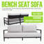 Ensemble de conversation extérieur 4 pièces avec fauteuils club modernes, canapé luxueux avec banc, table basse en pierre frittée d'inspiration marbre, structure en aluminium noir antirouille Ember et coussins Sunbrella