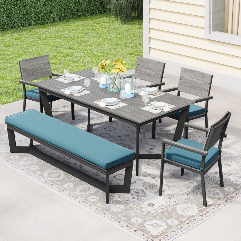 Abby 78.74'' Rectangular 6 - Person Outdoor Dining Set with Cushions, Peacock/Gray