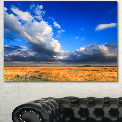 « clouded blue sky over prairie », reproduction de photo sur toile tendue