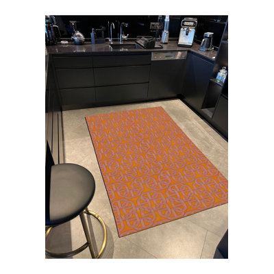 Tapis orange lavable à la machine
