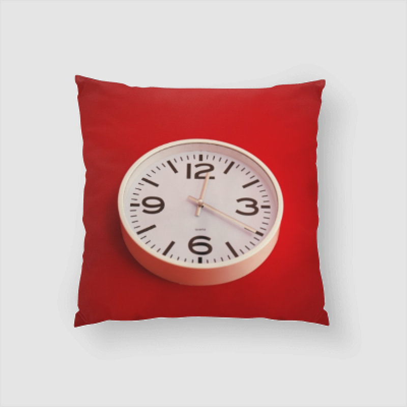 Coussin horloge sur fond Albie
