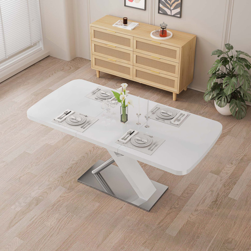 Table de salle à manger extensible 47,25 - 63 po blanche brillante pour 4 à 6 personnes