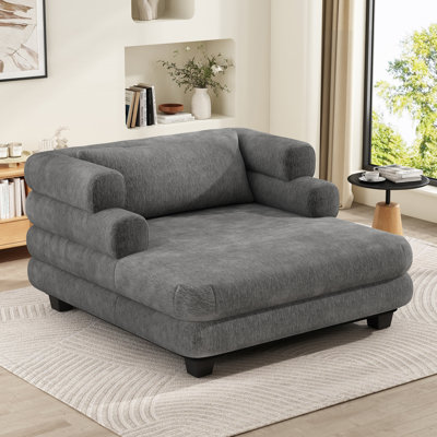 Chaise longue surdimensionnée rembourrée avec assise profonde et accoudoirs superposés
