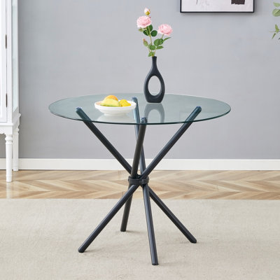 Une table ronde circulaire en verre trempé transparent d'un diamètre de 36,6 pouces