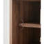 Petite armoire d'appoint en verre sur pied