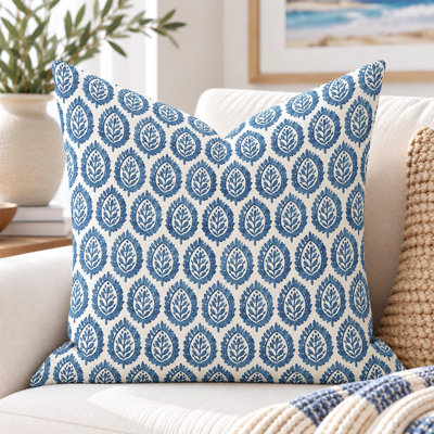 Coussin bleu indigo et feuille blanche