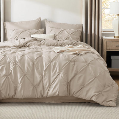 Édredon à plis pincés avec draps, taies d'oreiller et taies décoratives