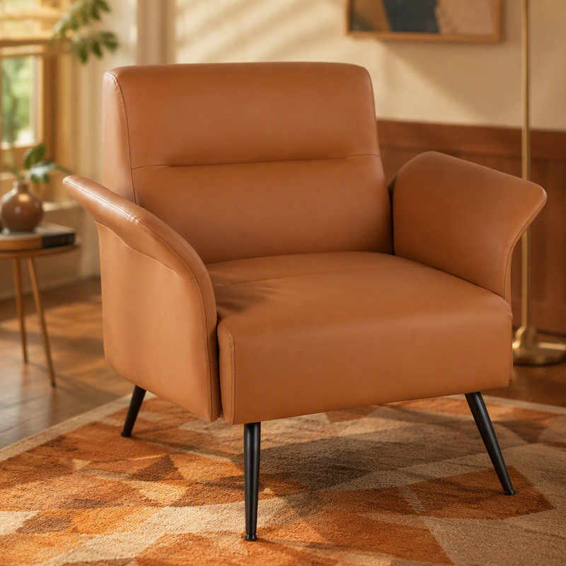 Fauteuil d'appoint contemporain avec pieds en métal noir et revêtement en similicuir, idéal pour les intérieurs modernes et offrant une assise confortable.